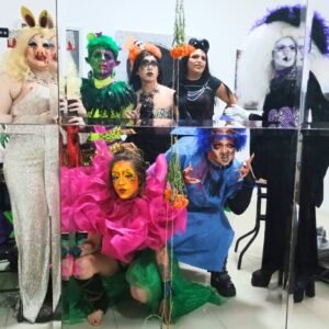 drag artists posing backstage at their graudation show